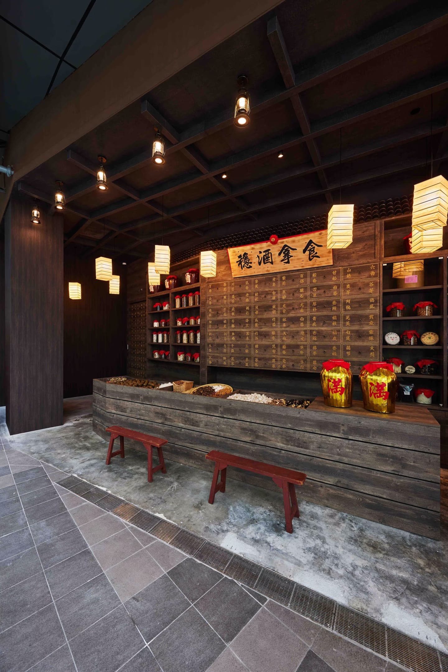 TCM-inspired Synthesis Bar interior with warm back bar lighting