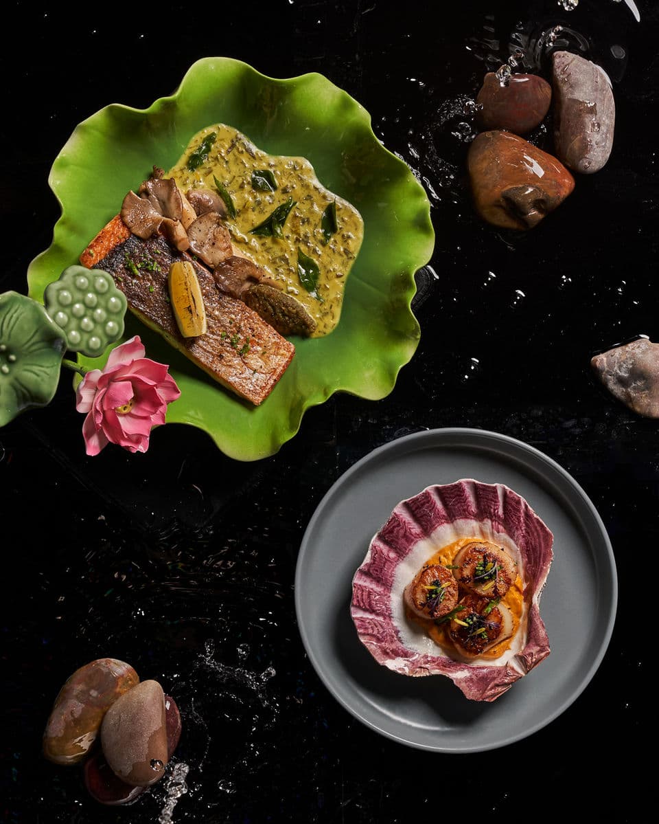 Synthesis bar bites served together on a dark tabletop